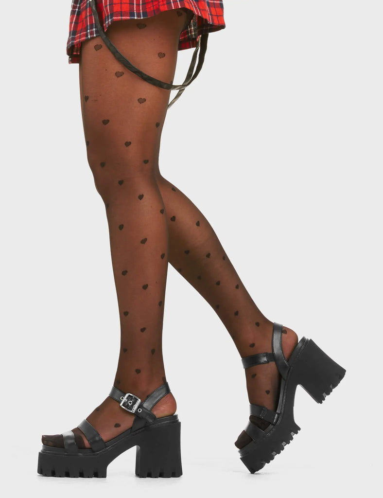 DONT CARE
 
 New Rules Chunky Platform Sandals in Black faux leather. These platform sandals feature a strap across the upper with a adjustable ankle strap, perfect balance of style and cuteness. Made with eco-friendly materials and 100% cruelty-free, these platform boots are as ethical as they are CUTE!
 
 - Platform Height
 - Heel Height
 - Adjustable black strap
 - Sqaure shaped buckle
 - Silver eyelets 
 - Chunky Platform sole
 - Rubb34 teeth grip
 - Round Toe 
 - 100% vegan 
 
 SKU: LMF 3913 - BlackPU