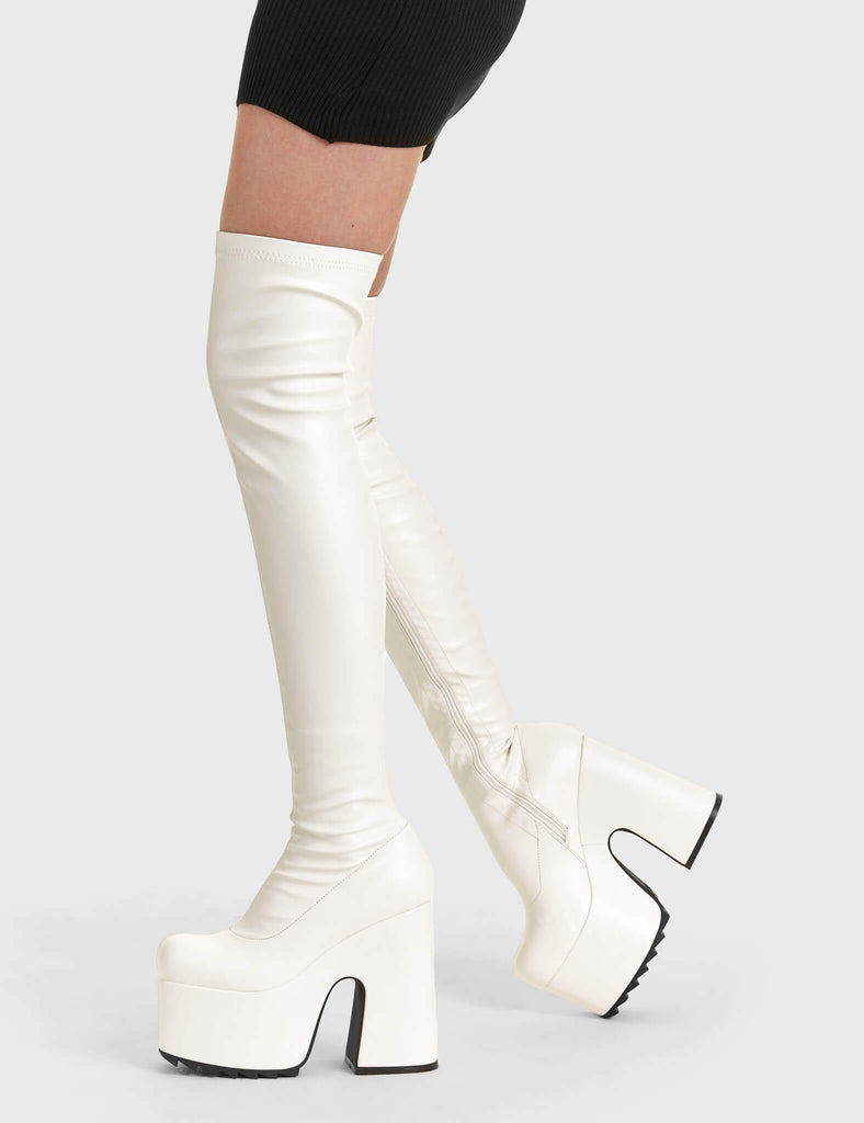 Solid Slammers
  
 Not Ready Chunky Platform Thigh High Boots in White faux leather. These white vegan Platform Boots feature on our chunky platform sole, make a statment and stomp with chunky elevation. Made with eco-friendly materials and 100% cruelty-free, these platform boots are as ethical as they are dominant!
 
 
 - Platform Height
 - Heel Height 
 - White zipper
 - Shark's teeth rubber grip 
 - Chunky platform sole
 - Round Toe
 - 100% vegan 
 
 SKU: LMF 2073 - WhitePU