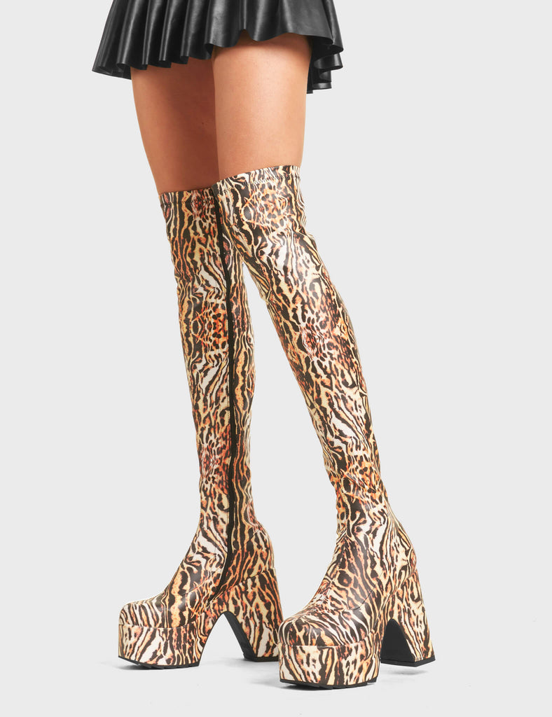 Not Your Worry Platform Thigh High Boots in Tiger. Feature a platfrom and a stretch fit.