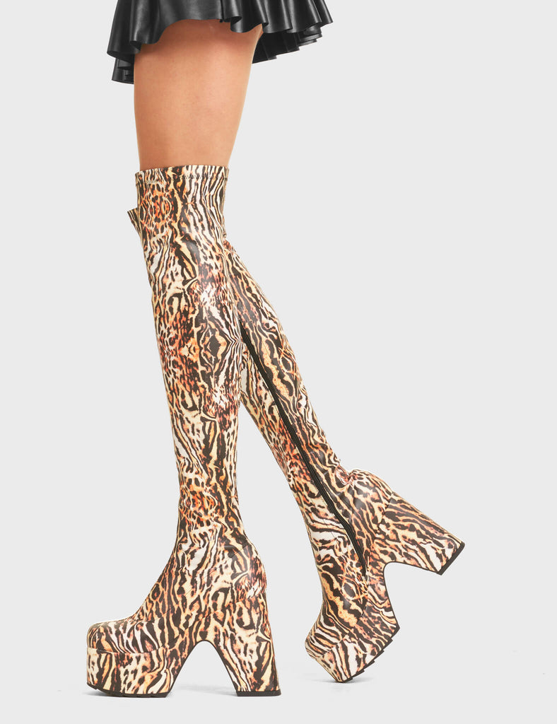 Not Your Worry Platform Thigh High Boots in Tiger. Feature a platfrom and a stretch fit.
