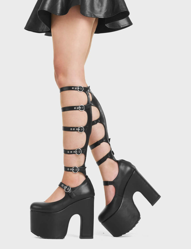 On A Loop Chunky Platform Knee High Boots. These Platform Knee High Boots feature adjustable straps with Silver buckles.
