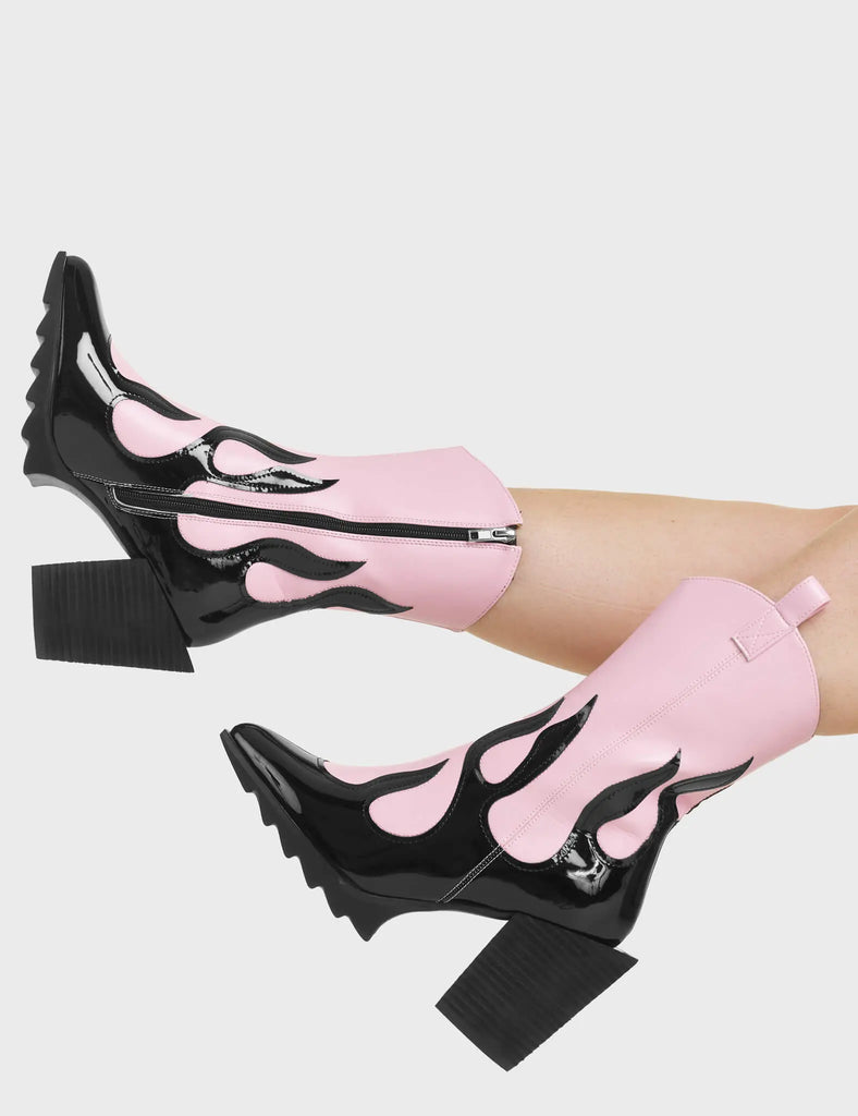 On Fire Western Ankle Boots. These pink Ankle Boots feature a black flame design, and a signature western block heel. 
