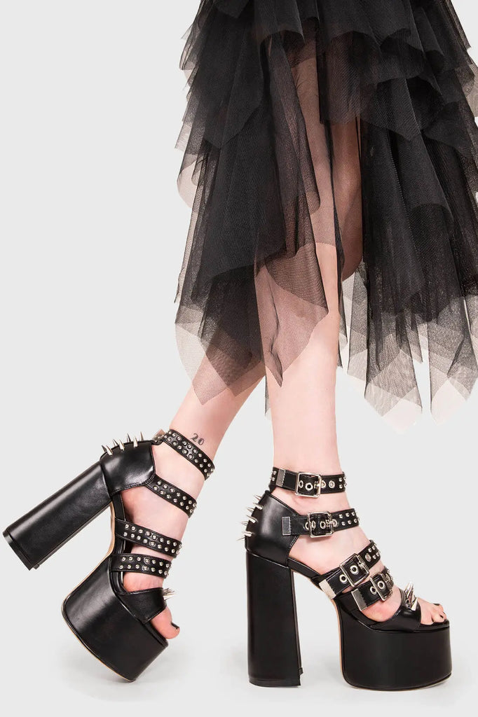 IT'S ALL IN THE DETAILS!

Revin' Plaform Sandals in Black faux leather. These vegan Platform Sandals feature silves spikes with a Platform sole and high heel, perfect for adding height and glamour to any outfit. Made with eco-friendly materials and 100% cruelty-free, these Sandals are as ethical as they are badass!


- Platform Height: 2.5 inch
- Heel Height: 5.5 inch 
- Open Toe
- Adjustable ankle straps
- Silver spikes & studs
- High Platform sole
- Round toe 
- 100% vegan 

SKU: LMS 195 - BlackPU