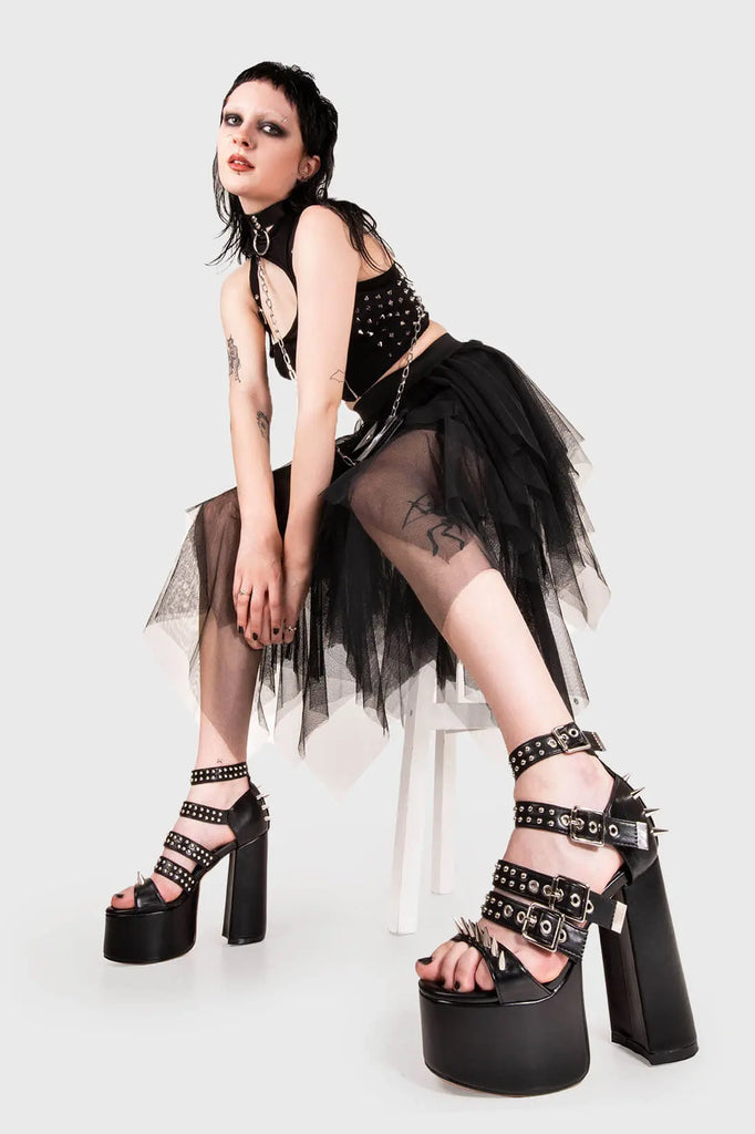 IT'S ALL IN THE DETAILS!

Revin' Plaform Sandals in Black faux leather. These vegan Platform Sandals feature silves spikes with a Platform sole and high heel, perfect for adding height and glamour to any outfit. Made with eco-friendly materials and 100% cruelty-free, these Sandals are as ethical as they are badass!


- Platform Height: 2.5 inch
- Heel Height: 5.5 inch 
- Open Toe
- Adjustable ankle straps
- Silver spikes & studs
- High Platform sole
- Round toe 
- 100% vegan 

SKU: LMS 195 - BlackPU