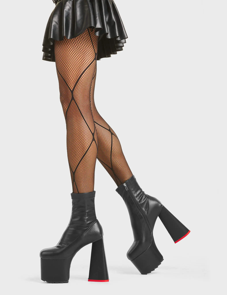 HEART TO HEART
 
 Rom-Com Platform Ankle Boots in Black fitted faux leather. These platform boots feature a minimalist look with a heart shaped heel and a red heart at the bottom, keeping it nice and classy. Made with eco-friendly materials and 100% cruelty-free, these platform boots are as ethical as they are chic.
 
 - Platform Height
 - Ankle Length
 - Fitted Feel
 - Red Heart
 - Heart Heel
 - High Heel
 - 100% Vegan
 
 SKU: LMF 5479 - BlackPU