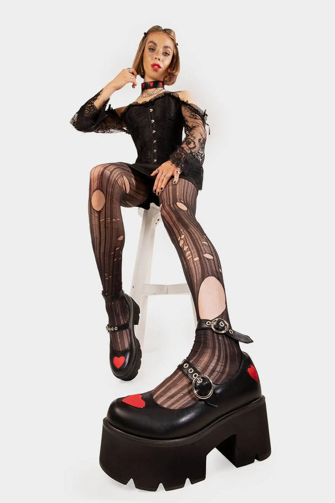 THE ICON
 
 Rosey Love Chunky Mary Jane Shoes in Black Faux Leather. These Mary Janes feature a Red faux suede hearts on a Chunky and comfortable Platform sole. Everyone needs a pairs of Mary Janes! Made with eco-friendly materials and 100% cruelty-free, these Mary Janes are as ethical as they are cute!
 
 
 - Platform Height: 3 inch
 - T Bar structure
 - Red Hearts
 - O shaped buckles and silver eyelets
 - Chunky Platform sole
 - Round toe 
 - 100% vegan 
 
 SKU: LMS 449 - BlackPU/Red