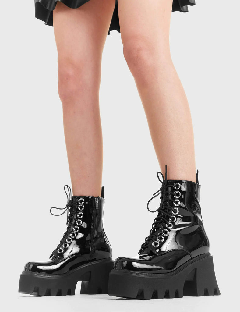 TAKE ON THE WORLD
 
 Run To You Chunky Platform Ankle Boots in Black Patent. These vegan Boots feature a CHUNKY Platform sole and large O shaped eyelets, perfect for adding height and edge to any outfit. Made with eco-friendly materials and 100% cruelty-free, these Boots are as ethical as they are hot!
 
 
 - Platform Height: 3.3 inch
 - Black zipper
 - Lace up
 - O shaped buckle and silver eyelets
 - CHUNKY Platform sole
 - Square toe 
 - 100% vegan 
 
 SKU: LMF 1370 - BlackPAT