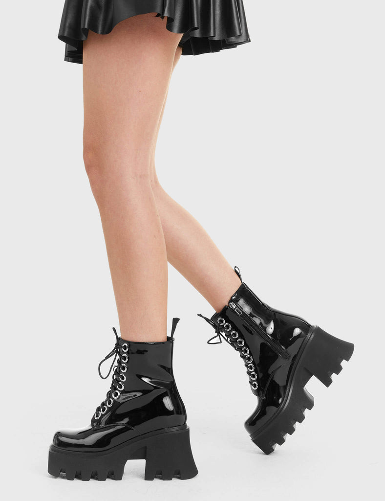 TAKE ON THE WORLD
 
 Run To You Chunky Platform Ankle Boots in Black Patent. These vegan Boots feature a CHUNKY Platform sole and large O shaped eyelets, perfect for adding height and edge to any outfit. Made with eco-friendly materials and 100% cruelty-free, these Boots are as ethical as they are hot!
 
 
 - Platform Height: 3.3 inch
 - Black zipper
 - Lace up
 - O shaped buckle and silver eyelets
 - CHUNKY Platform sole
 - Square toe 
 - 100% vegan 
 
 SKU: LMF 1370 - BlackPAT
