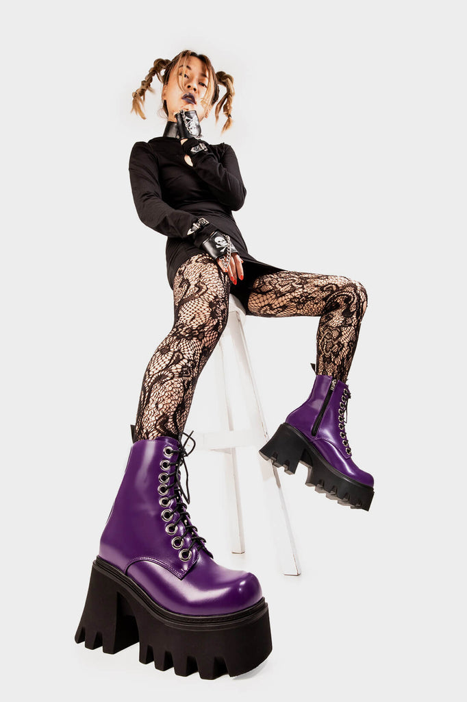 TAKE ON THE WORLD
 
 Run To You Chunky Platform Ankle Boots in Purple. These vegan Boots feature a CHUNKY Platform sole and large O shaped eyelets, perfect for adding height and edge to any outfit. Made with eco-friendly materials and 100% cruelty-free, these Boots are as ethical as they are hot!
 
 
 - Platform Height: 3.3 inch
 - Black zipper
 - Lace up
 - O shaped buckle and silver eyelets
 - CHUNKY Platform sole
 - Square toe
 - 100% vegan
 
 SKU: LMF 1370 - PurplePU