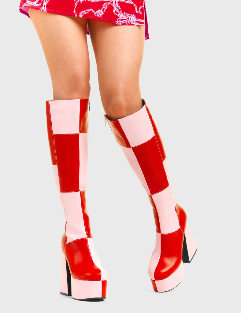 TIME TO DANCE
 
 Runway Platform Knee High Boots in Pink and Red faux leather. These platform boots feature a pink and red patch work design with a triangle heel, keeping it nice and classy. Made with eco-friendly materials and 100% cruelty-free, these platform boots are as ethical as they are chic.
 
 - Platform Height
 - Knee high length
 - Patch work design
 - Triangle heel
 - High Heel
 - 100% vegan 
 
 SKU: LMF 3361 - PinkPU/RedPU