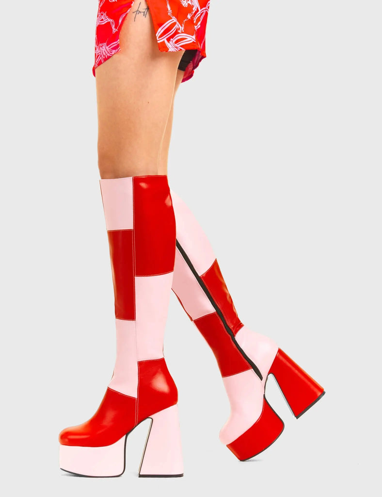 TIME TO DANCE
 
 Runway Platform Knee High Boots in Pink and Red faux leather. These platform boots feature a pink and red patch work design with a triangle heel, keeping it nice and classy. Made with eco-friendly materials and 100% cruelty-free, these platform boots are as ethical as they are chic.
 
 - Platform Height
 - Knee high length
 - Patch work design
 - Triangle heel
 - High Heel
 - 100% vegan 
 
 SKU: LMF 3361 - PinkPU/RedPU