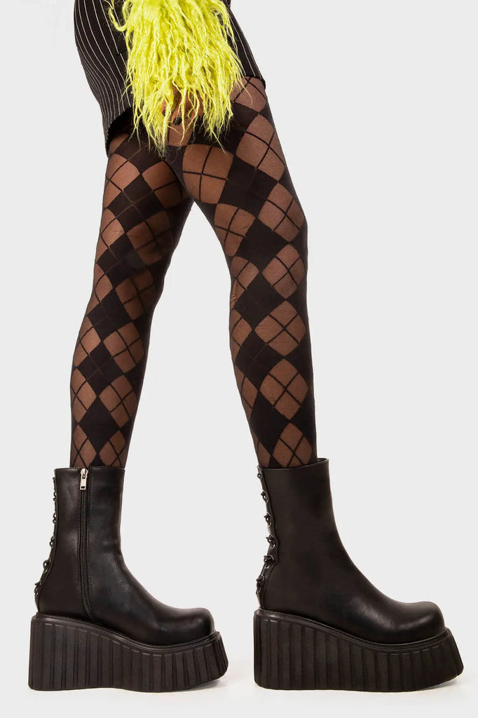 Clean and Crisp
 
 Say My Name Chunky Ankle Creeper Boots in Black faux leather. These black platform boots feature black lace up detail with silver eyelets towards the back, making a bold statment with each step.Made with eco-friendly materials and 100% cruelty-free, these platform boots are as ethical as they are Sleek!
 
 - Platform Height
 - Black zipper
 - Black laces and silver eyelets 
 - Chunky platform creeper wedge sole
 - Round Toe 
 - 100% vegan 
 
 SKU: LMF 2212 - BlackPU