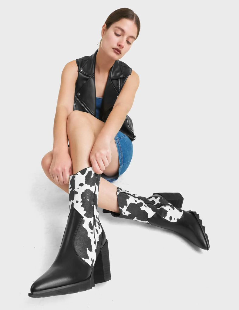 Seen Before Western Ankle Boots, These Ankle Boots feature a cute cow print design, and features a signature western block heel.