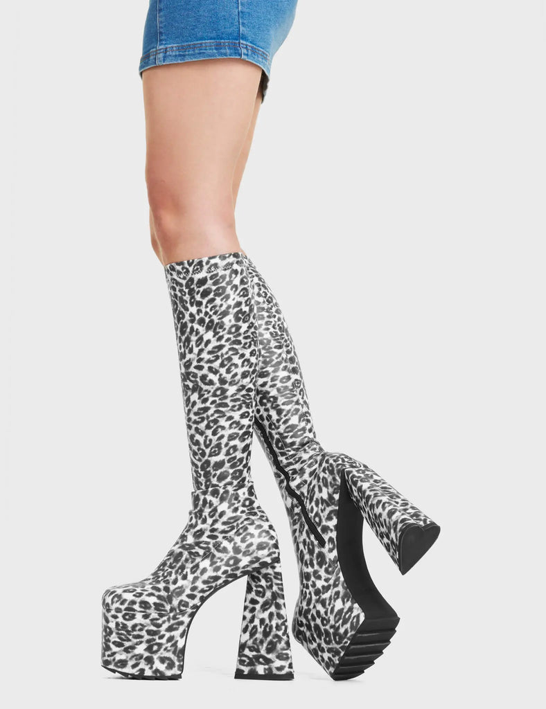 Smokeshow Platform Knee High Boots feature a leopard print design, on our platform sole and heart shaped heel.