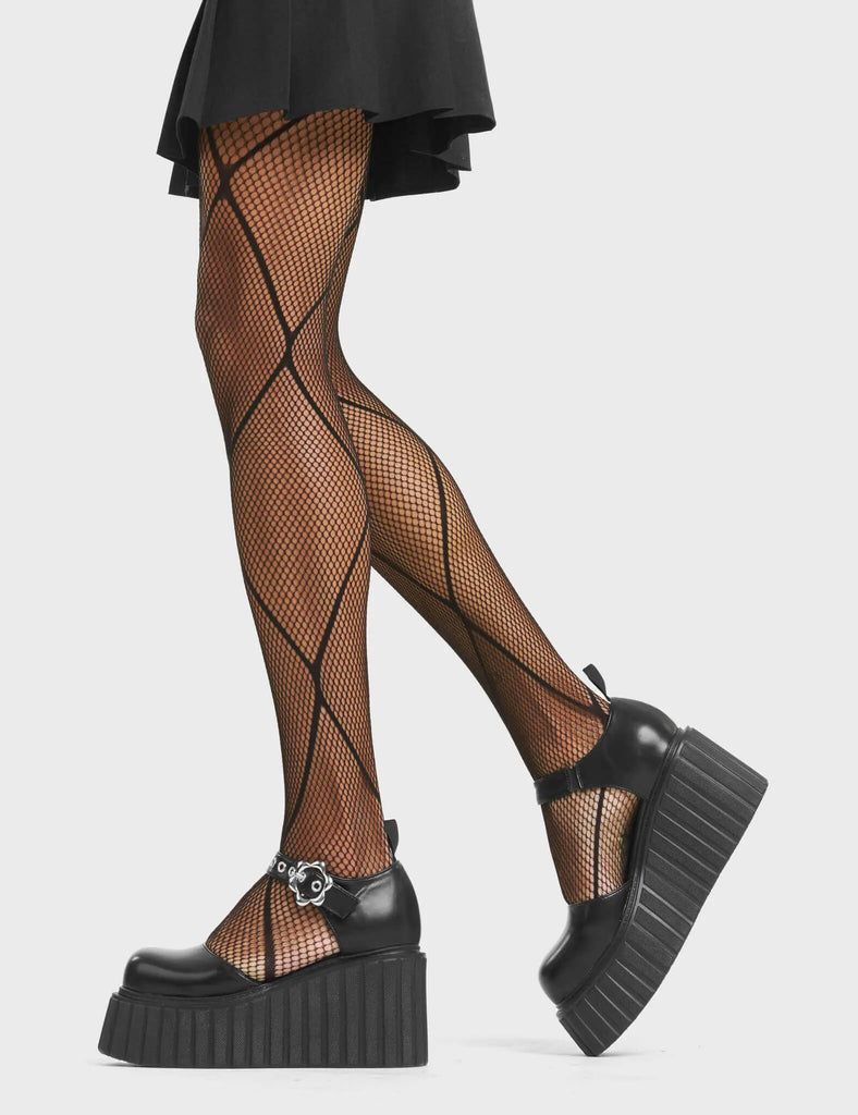 SEASONS
 
 Spring Sunshine Platform Creeper Shoes in Black Faux Leather. These vegan creeper shoes feature silver eyelets on a adjustable strap with a flower shaped silver buckle, very classy. Made with eco-friendly materials and 100% cruelty-free, these shoes are as ethical as they are edgy!
 
 - Chunky Platform
 - Adjustable Strap
 - Flower Silver Buckle
 - Silver Eyelets
 - Rounded toe
 - 100% vegan
 
 SKU: LMF 4528 - BlackPU