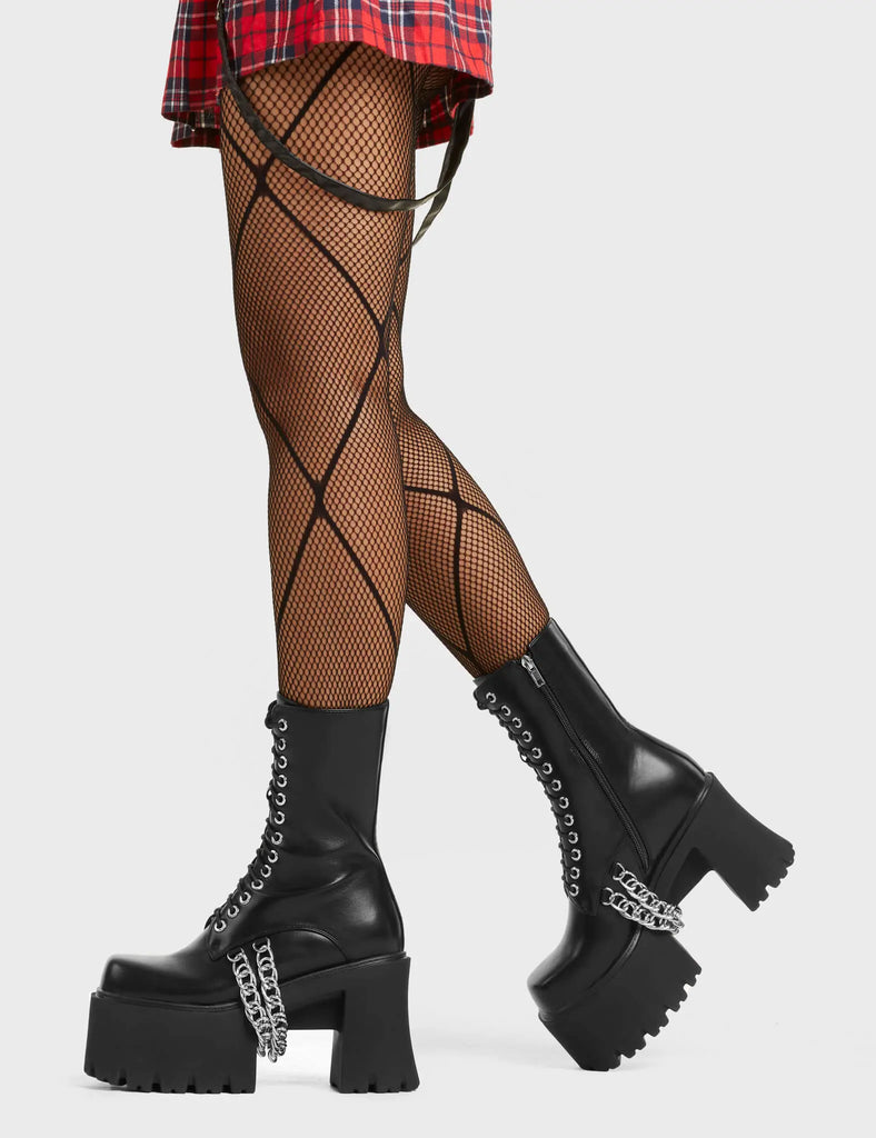 FAST LANE
 
 Step On It Chunky Platform Ankle Boots in black faux leather. These black vegan Platform Boots feature lace up design with sillver eyelets and two silver aestehtic chains. Also includes a functional zip on our rubber grip, chunky platform sole. Made with eco-friendly materials these platform boots are as ethical as they are perfect!
 
 
 - Platform Height: 
 - Black Zipper
 - Lace Up Design 
 - Silver Eyelets
 - Silver Chains
 - Chunky Platform Sole
 - 100% vegan
 
 SKU: LMF 4118 - BlackPU