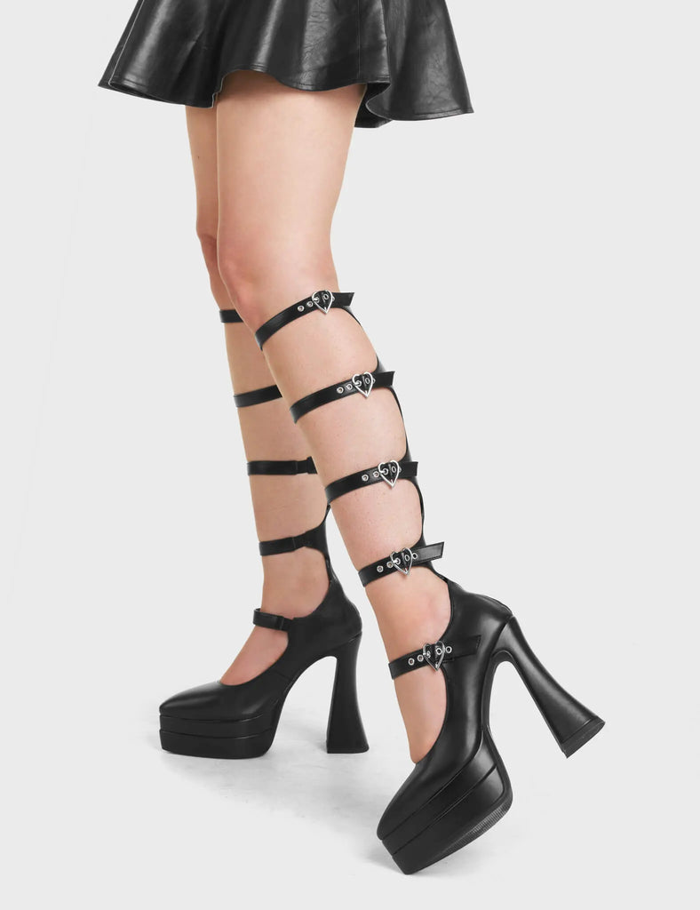 Sweet Talking Woman Platform Knee High Boots feature adjustable straps with silver heart shaped buckles running up the leg.