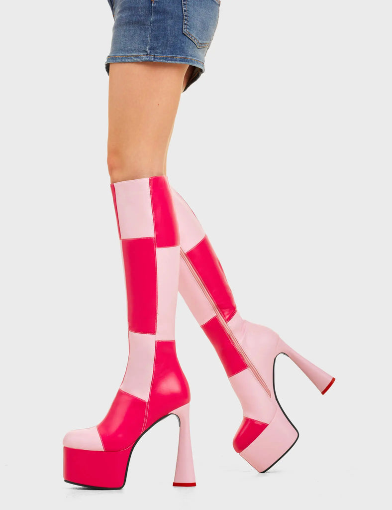 SPLIT SCREEN
 
 Sweet Tooth Platform Knee High Boots in Pink and Fuchsia faux leather. These platform boots feature a pink and fuchsia patch work design with a heart shaped heel and a red heart at the bottom. Made with eco-friendly materials and 100% cruelty-free, these platform boots are as ethical as they are chic.
 
 - Platform Height
 - Knee high length
 - Patch work design
 - Heart heel
 - Red Heart
 - High Heel
 - 100% vegan
 
 SKU: LMF 4474 - PinkPU/FuchsiaPU