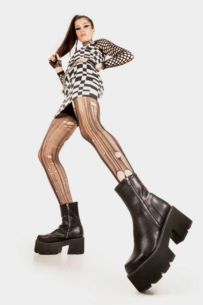 Trendsetter 
 
 Tell Me Lies Chunky Platform Boots. These black vegan Platform Boots feature on our chunky platform sole, comfortable , classic and all round confident. Made with eco-friendly materials and 100% cruelty-free, these platform boots are as ethical as they are cute!
 
 
 - Platform Height: 3 inch
 - Silver zipper 
 - Chunky Platform sole
 - Round Toe
 - 100% vegan 
 
 SKU: LMF 1845 - BlackPU