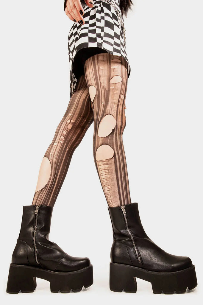 Trendsetter 
 
 Tell Me Lies Chunky Platform Boots. These black vegan Platform Boots feature on our chunky platform sole, comfortable , classic and all round confident. Made with eco-friendly materials and 100% cruelty-free, these platform boots are as ethical as they are cute!
 
 
 - Platform Height: 3 inch
 - Silver zipper 
 - Chunky Platform sole
 - Round Toe
 - 100% vegan 
 
 SKU: LMF 1845 - BlackPU