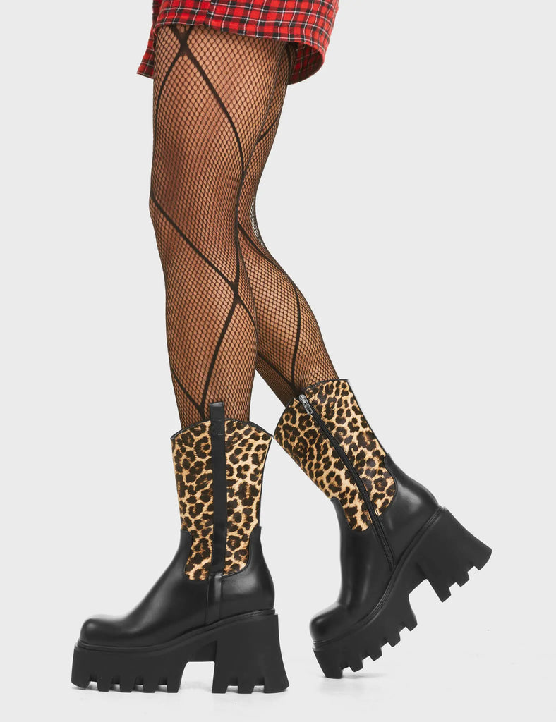 Virtuous Chunky Platform Ankle Boots in Black and Leopard. Feature a western-style upper on a chunky platform heel.