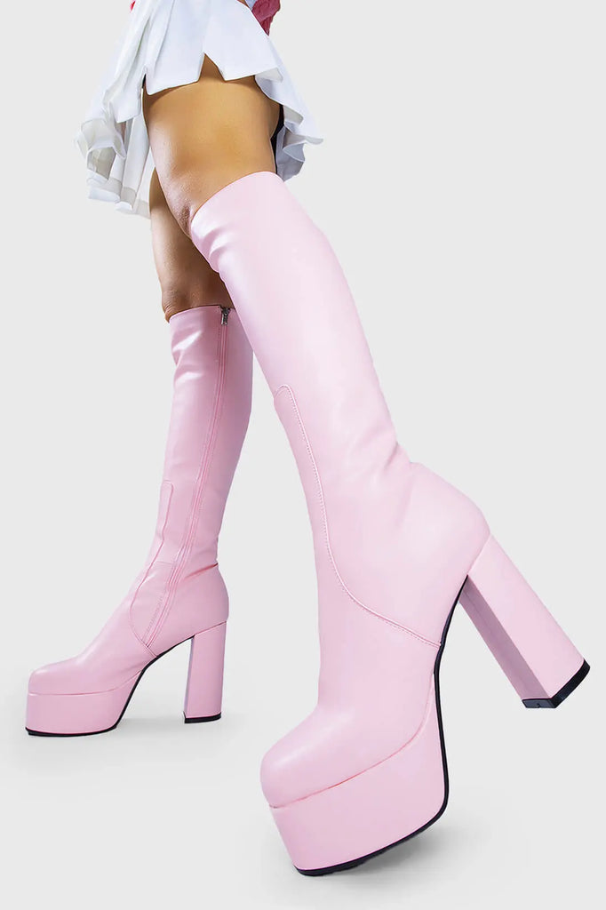 THE TIMELESS ONE
 
 Whatta Showdown Platform Knee High Boots in Pink faux leather. These Pink vegan Boots feature an elegant, minimalist design and a Platform sole and heel, perfect for adding height and style to any outfit. Made with eco-friendly materials and 100% cruelty-free, these boots are as ethical as they are stylish.
 
 
 - Platform Height: 1.25 inch
 - Heel Height: 4.2 inch
 - Knee High length
 - Pink zipper 
 - Platform sole
 - Round toe 
 - 100% vegan 
 
 SKU: LMF 0916 - PinkPU